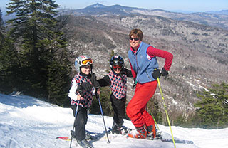 A family enjoys the abundance of downhill terrain in the Mad River Valley